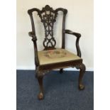 A Georgian style carver chair of Chippendale desig