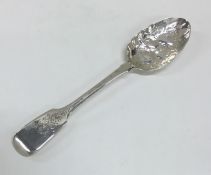 A Georgian silver fiddle pattern berry spoon of ty