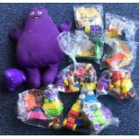A set of four 'Island Getaway' McDonald's toys dat