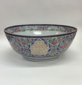 A good Chinese tapering fruit bowl decorated in br