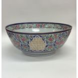 A good Chinese tapering fruit bowl decorated in br