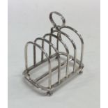 A good quality silver five bar toast rack / smartp