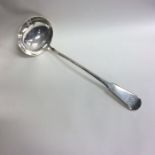 A Scottish silver fiddle pattern soup ladle. Edinb