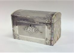 A large silver and MOP casket with hinged top deco