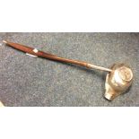 A large silver toddy ladle with pouring lip and co
