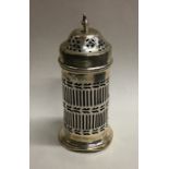 A silver pierced sugar shaker with BGL. Approx. 22