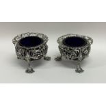 A pair of good quality cast silver salts decorated