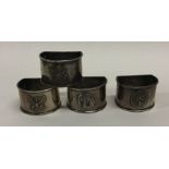 A set of four Indian silver napkin rings. Approx.