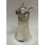 A large cast stirrup cup in the form of a fox's he