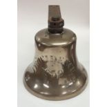 A large heavy brass ship's bell of tapering form i
