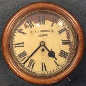 An oak cased kitchen clock. By F Lawrence of Abera