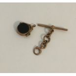 A small 9 carat spinning fob together with bar. Ap