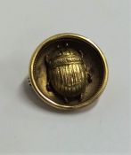 An Antique circular gold brooch mounted with a sca