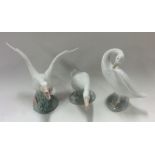 A group of three Lladro figures of geese. Est. £15