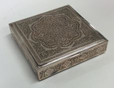 A square Persian silver hinged top box attractivel