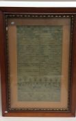 A framed and glazed sampler dated 1729. Est. £30 -