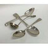 A fiddle pattern silver dessert spoon together wit