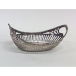 A Dutch boat shaped silver sweet dish with ball ri