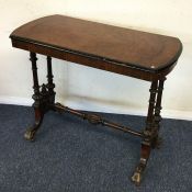 A Victorian walnut occasional table with inlaid de