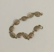 A 9 carat bracelet with Greek key pattern. Approx.