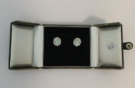 A pair of attractive diamond and tourmaline cluste