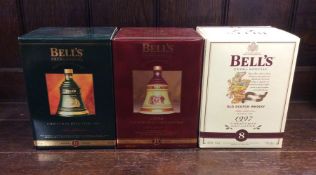 Three boxed Bell's Extra Special Old Scotch Whisky