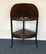 A Georgian mahogany corner wash stand with splayed