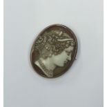 A Victorian hard stone cameo of a lady's head in r