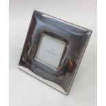 A square silver Concorde picture frame. London. By