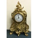 A massive reproduction brass mantle clock with whi