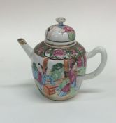 A small Canton teapot of typical design decorated