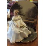 A Thomas Kinkade dressed porcelain headed doll in