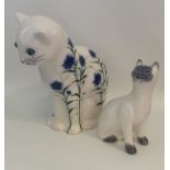 A tall Wemyss figure of a cat together with one ot