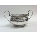 A good quality Edwardian silver sugar bowl with fl
