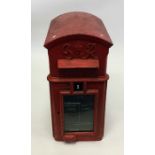 A Georgian domed top Royal Mail 'G R' red cast iro