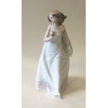 LLADRO: A cased figure of a dancing lady in long d