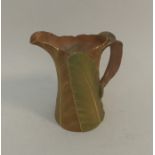 A small attractive Royal Worcester cream jug with