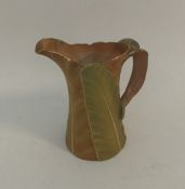 A small attractive Royal Worcester cream jug with