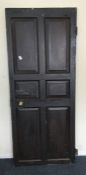 A Continental Antique oak panelled door. Est. £50