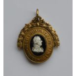 A rare Antique silver gilt medallion with wreath d