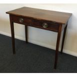 A Georgian mahogany two drawer side table. Est. £3
