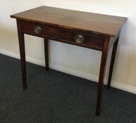 A Georgian mahogany two drawer side table. Est. £3