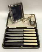 A modern plated snuff box together with tea knives