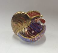 A Royal Crown Derby model of a cockerel in seated