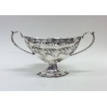 An Edwardian fancy silver sugar bowl with swirl de