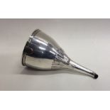 A rare silver wine funnel together with strainer a