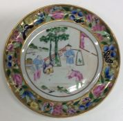 An attractive early Chinese plate decorated with g