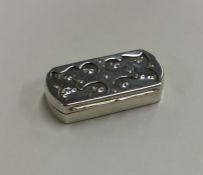 A stylish shaped top silver snuff box with gilt in