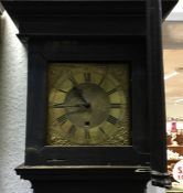 OF LOCAL INTEREST: An oak cased grandfather clock