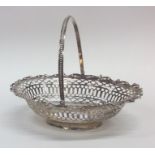 A Georgian silver swing handled basket on pedestal